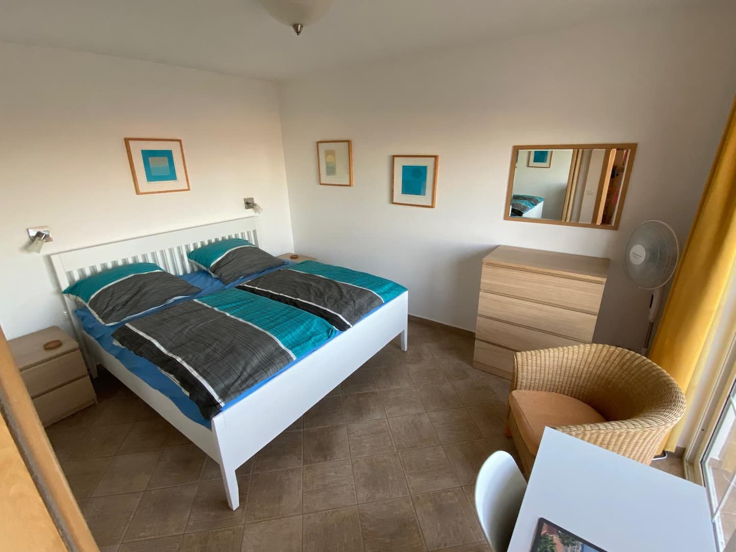 First-floor double bedroom with balcony access